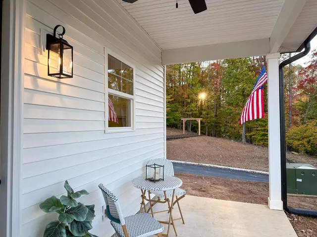 a view of a bench in front of a door