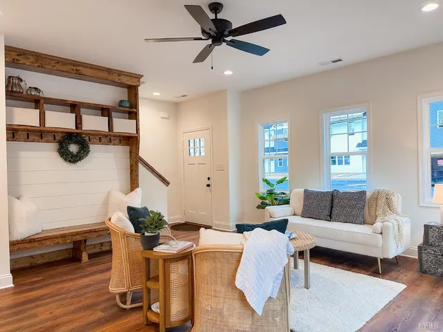 a living room with furniture and a window