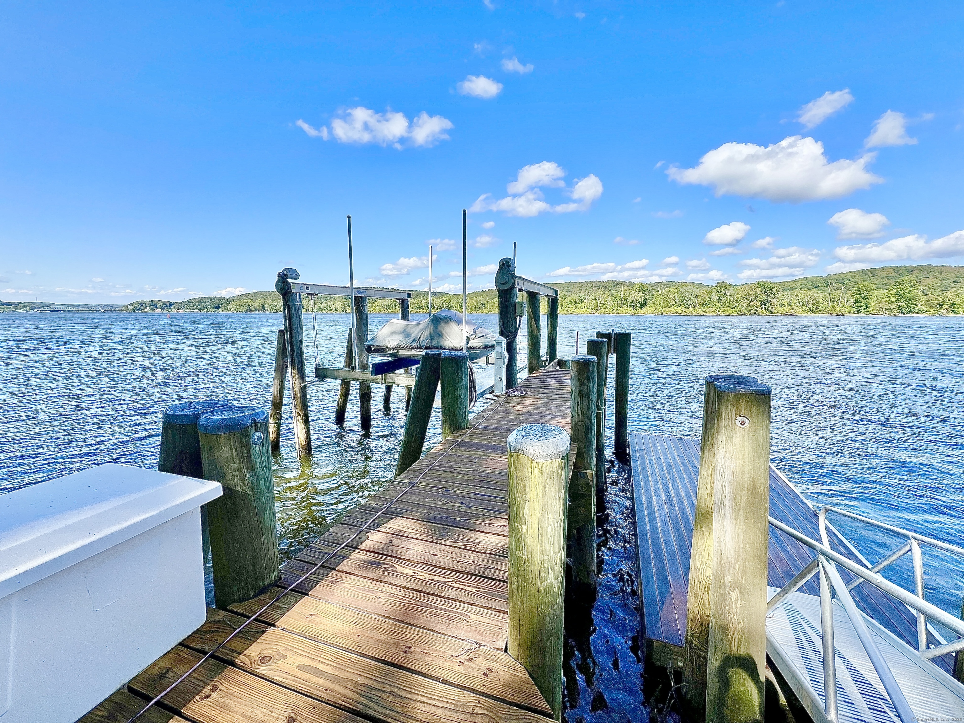 288 Middlesex Turnpike Chester, CT 06412 - Photo 4 of 38 2 slips, floating dock. Lift accomodates 16 ton vessel. Deep water dock.