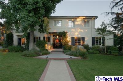 Undisclosed Address Glendale, CA 91202 - Photo 1 of 18 a front view of a house with garden