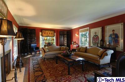 Undisclosed Address Glendale, CA 91202 - Photo 2 of 18 a living room with furniture tv and a large window