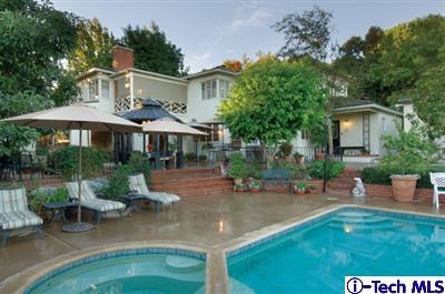 Undisclosed Address Glendale, CA 91202 - Photo 12 of 18 a front view of a house with garden