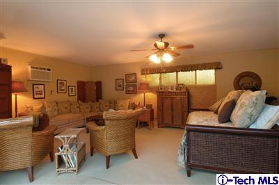 Undisclosed Address Glendale, CA 91202 - Photo 16 of 18 a living room with furniture and a chandelier