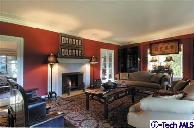 Undisclosed Address Glendale, CA 91202 - Photo 3 of 18 a living room with furniture a large window and a fireplace