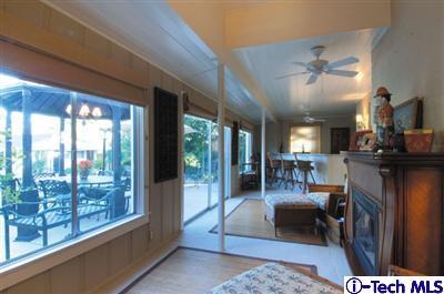 Undisclosed Address Glendale, CA 91202 - Photo 9 of 18 a living room with furniture and a floor to ceiling window