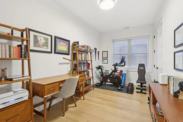 a room with furniture and a book shelf