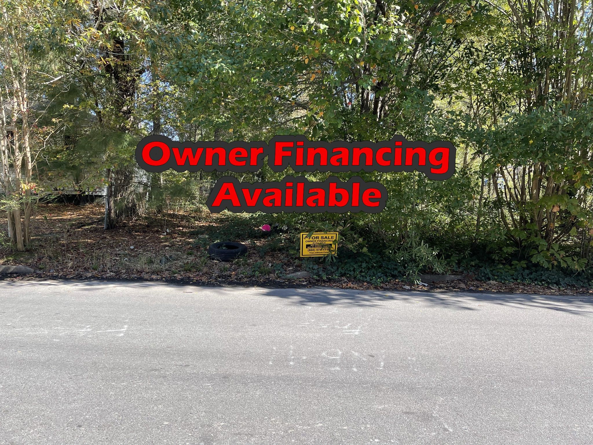 a sign that is sitting on a sidewalk