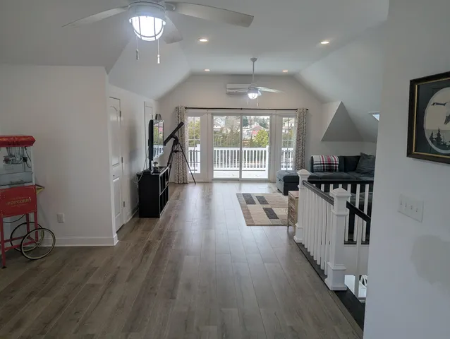 a view of swimming pool and an outdoor seating