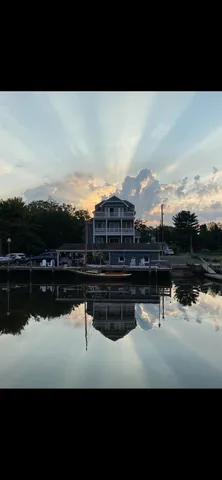 a view of a balcony with wooden floor