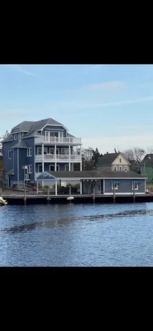 a view of a yard from a floor to ceiling window