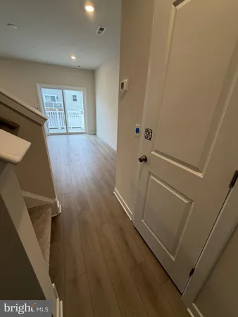 a view of entryway with wooden floor