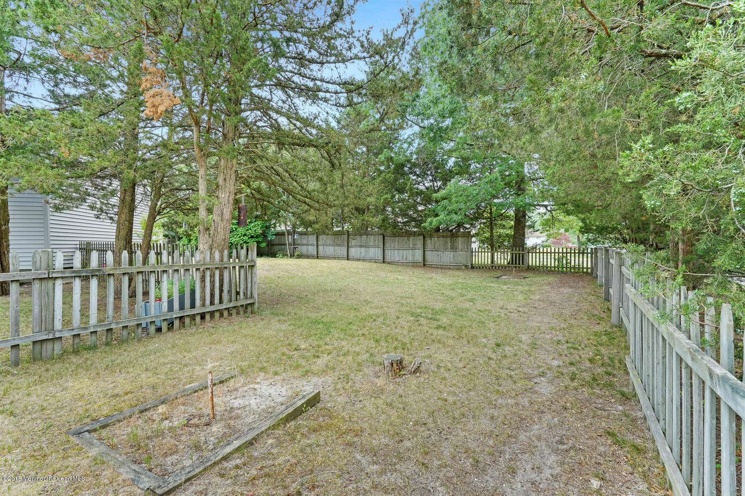 315 Stinson Road Brick, NJ 08723 - Photo 20 of 20 a view of a yard with wooden fence