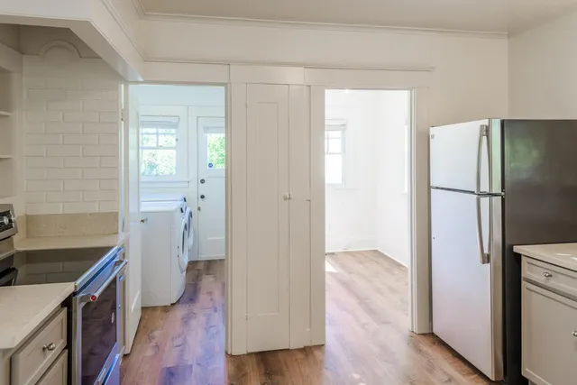 a view of a bathroom with sink and window