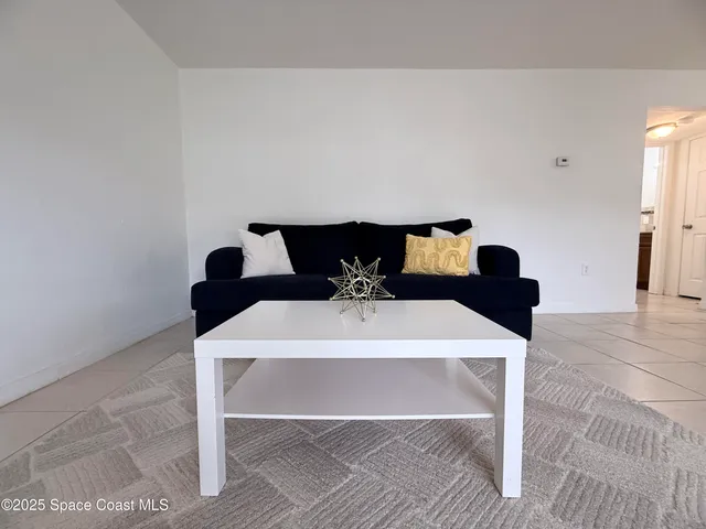 a view of a table and chairs in a room
