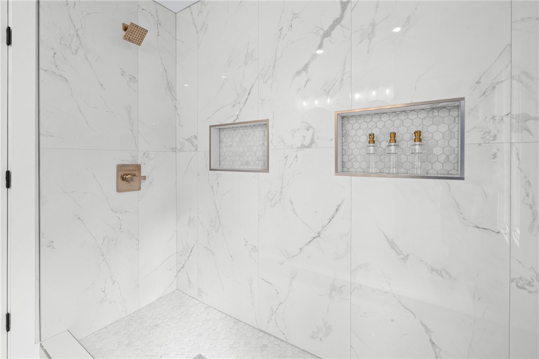 117 Riverpoint Drive Clemson, SC 29631 - Photo 26 of 47 This modern shower features elegant tile work and a sleek, functional design.