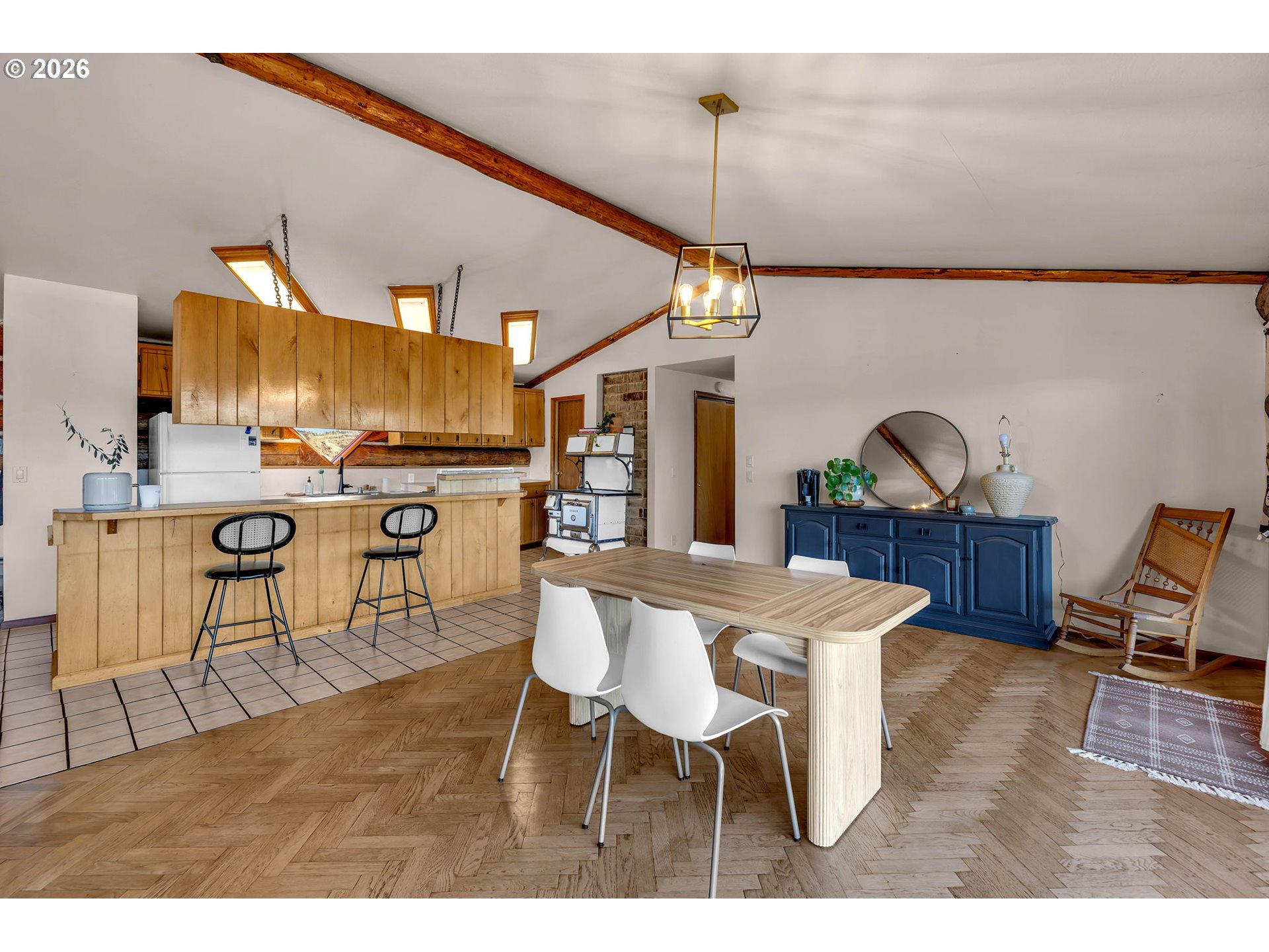 39904 Northeast Rotschy Road Yacolt, WA 98675 - Photo 11 of 48 a view of a dining room with furniture and wooden floor