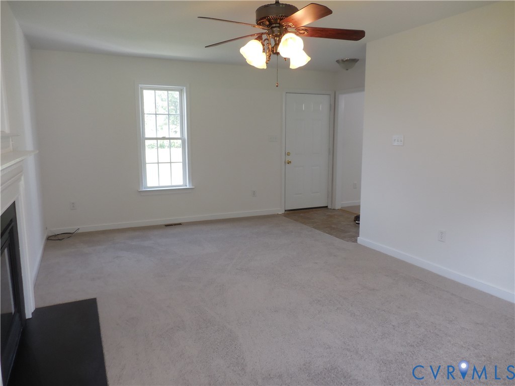 1781 Rolling Path Road Mineral, VA 23117 - Photo 6 of 23 Spacious room featuring neutral carpeting, white w