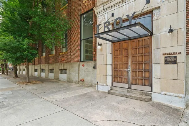 a view of a brick building with an outdoor space