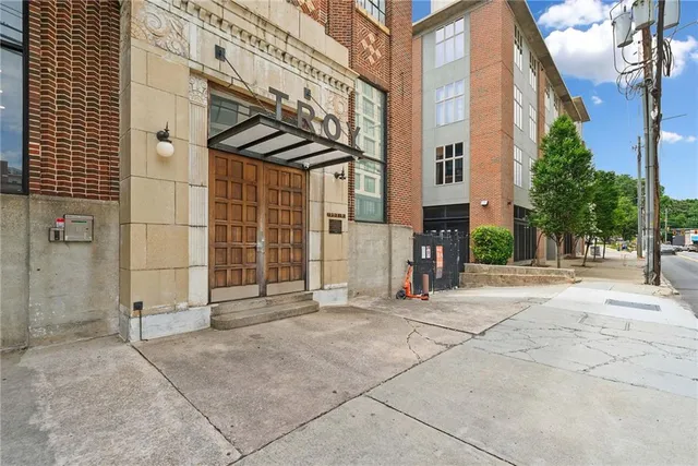 a view of a building with a street