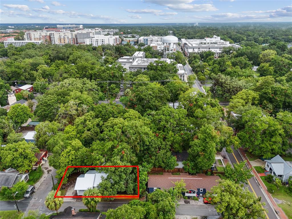 902 Northwest 4th Place Gainesville, FL 32601 - Photo 1 of 33 an aerial view of a house with a yard