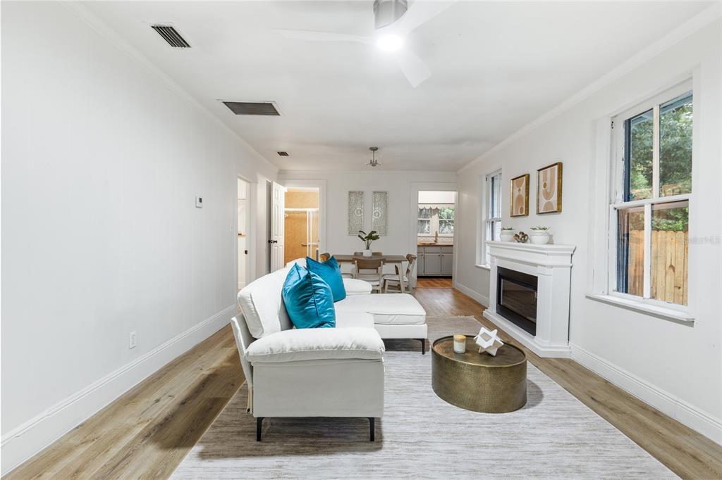 902 Northwest 4th Place Gainesville, FL 32601 - Photo 13 of 33 a living room with furniture and a fireplace