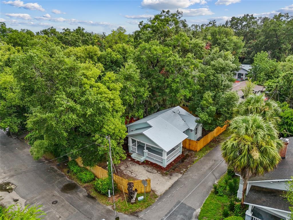 902 Northwest 4th Place Gainesville, FL 32601 - Photo 2 of 33 an aerial view of a house with a yard
