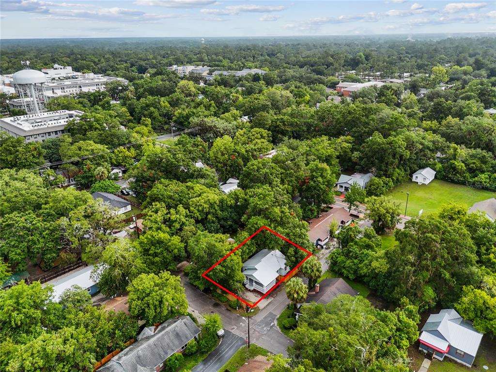 902 Northwest 4th Place Gainesville, FL 32601 - Photo 31 of 33 an aerial view of a residential houses with outdoor space and trees