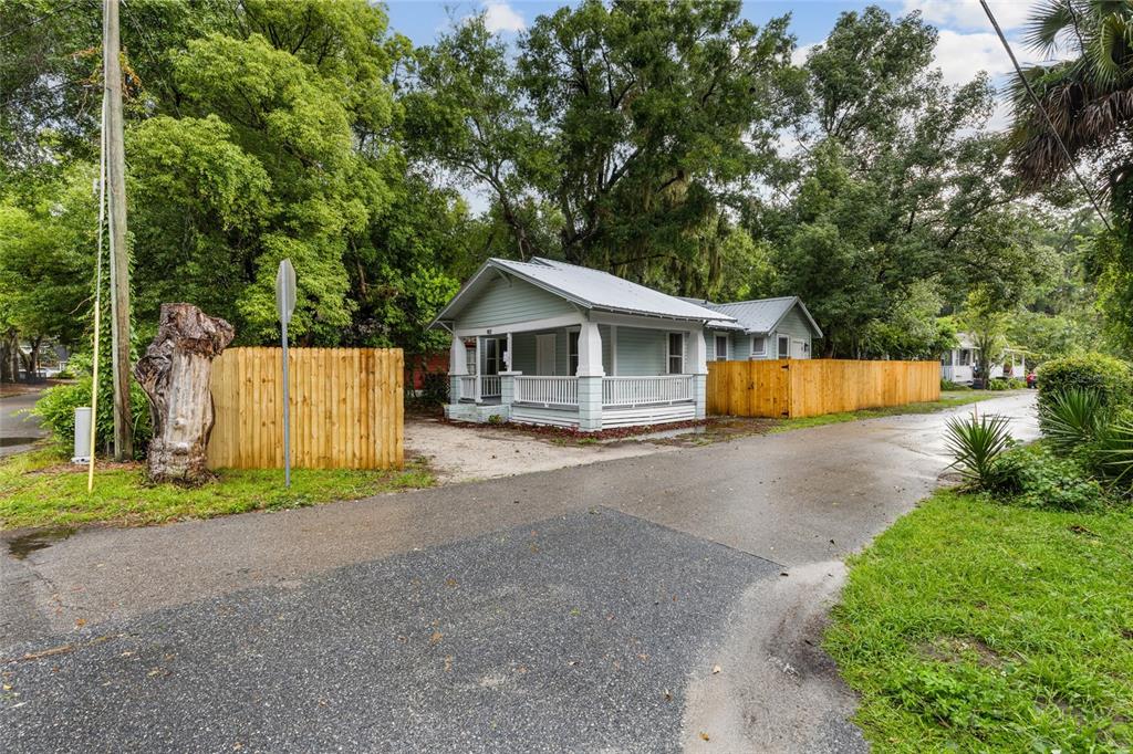 902 Northwest 4th Place Gainesville, FL 32601 - Photo 4 of 33 a front view of a house with a yard and a garage