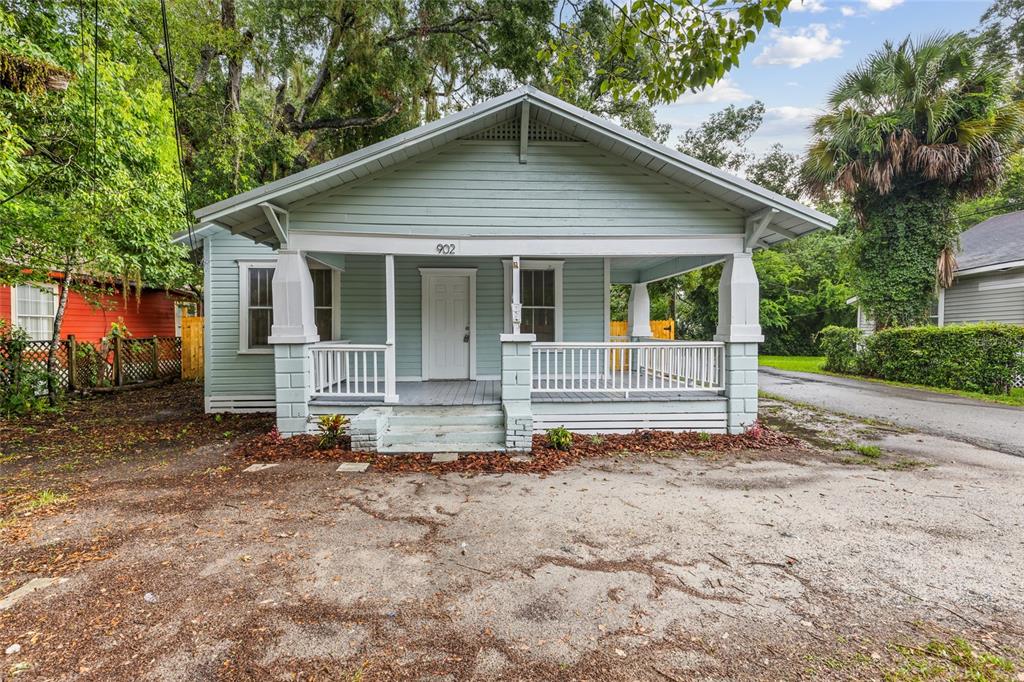 902 Northwest 4th Place Gainesville, FL 32601 - Photo 6 of 33 a front view of a house with a yard