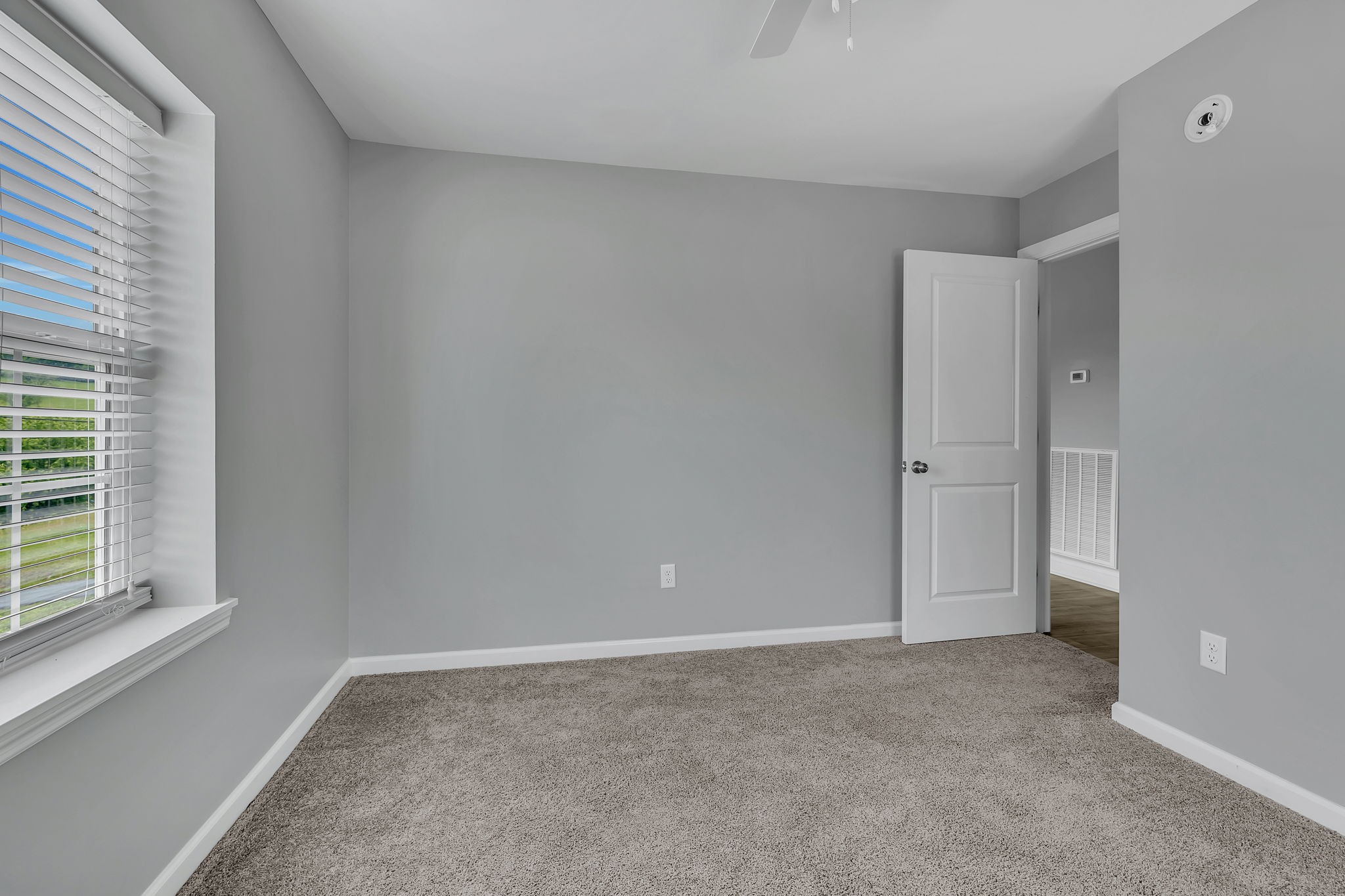 150 Hickman Highway Hickman, TN 38567 - Photo 19 of 42 a view of an empty room with a window