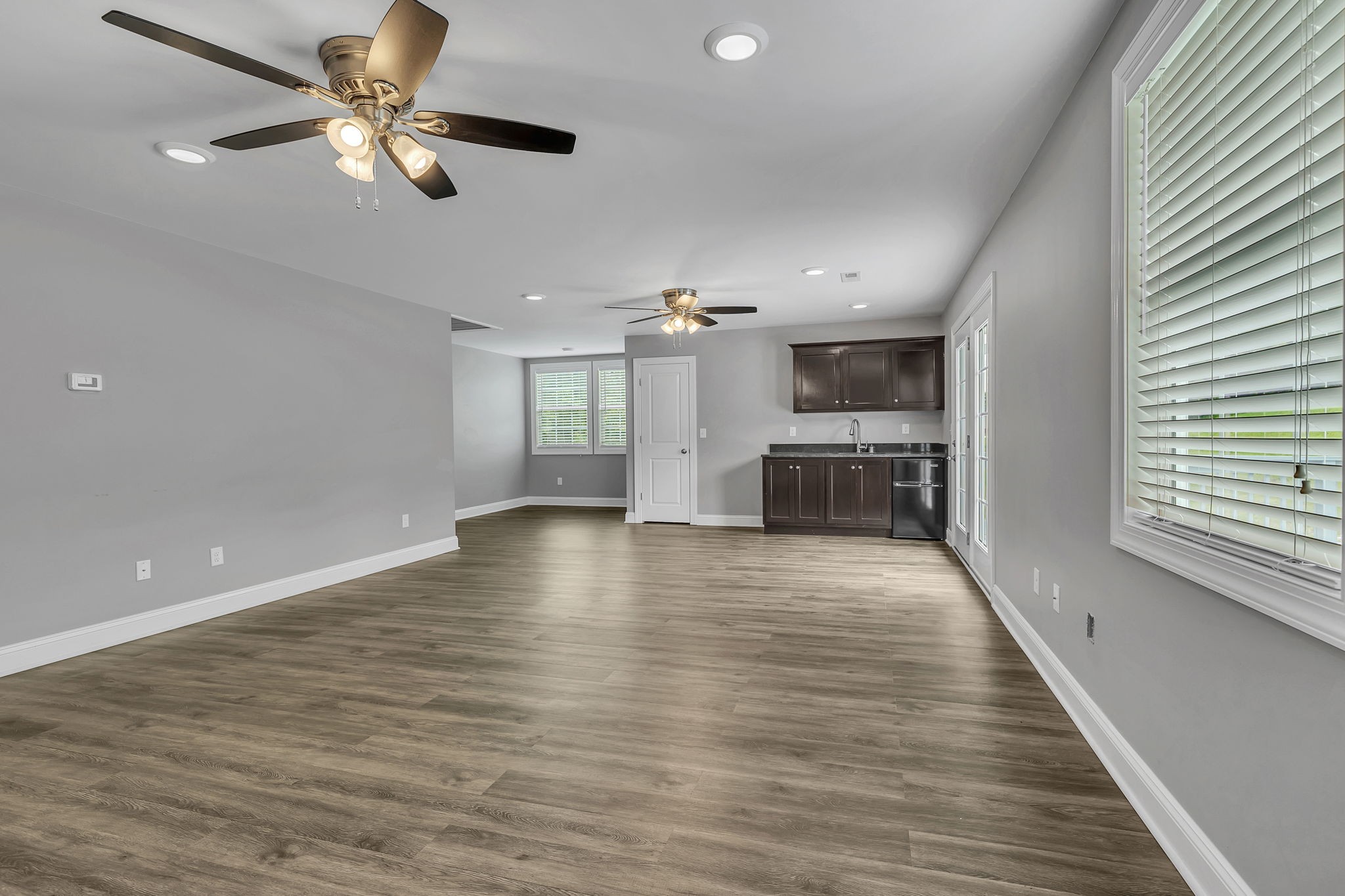 150 Hickman Highway Hickman, TN 38567 - Photo 23 of 42 wooden floor in an empty room with a kitchen