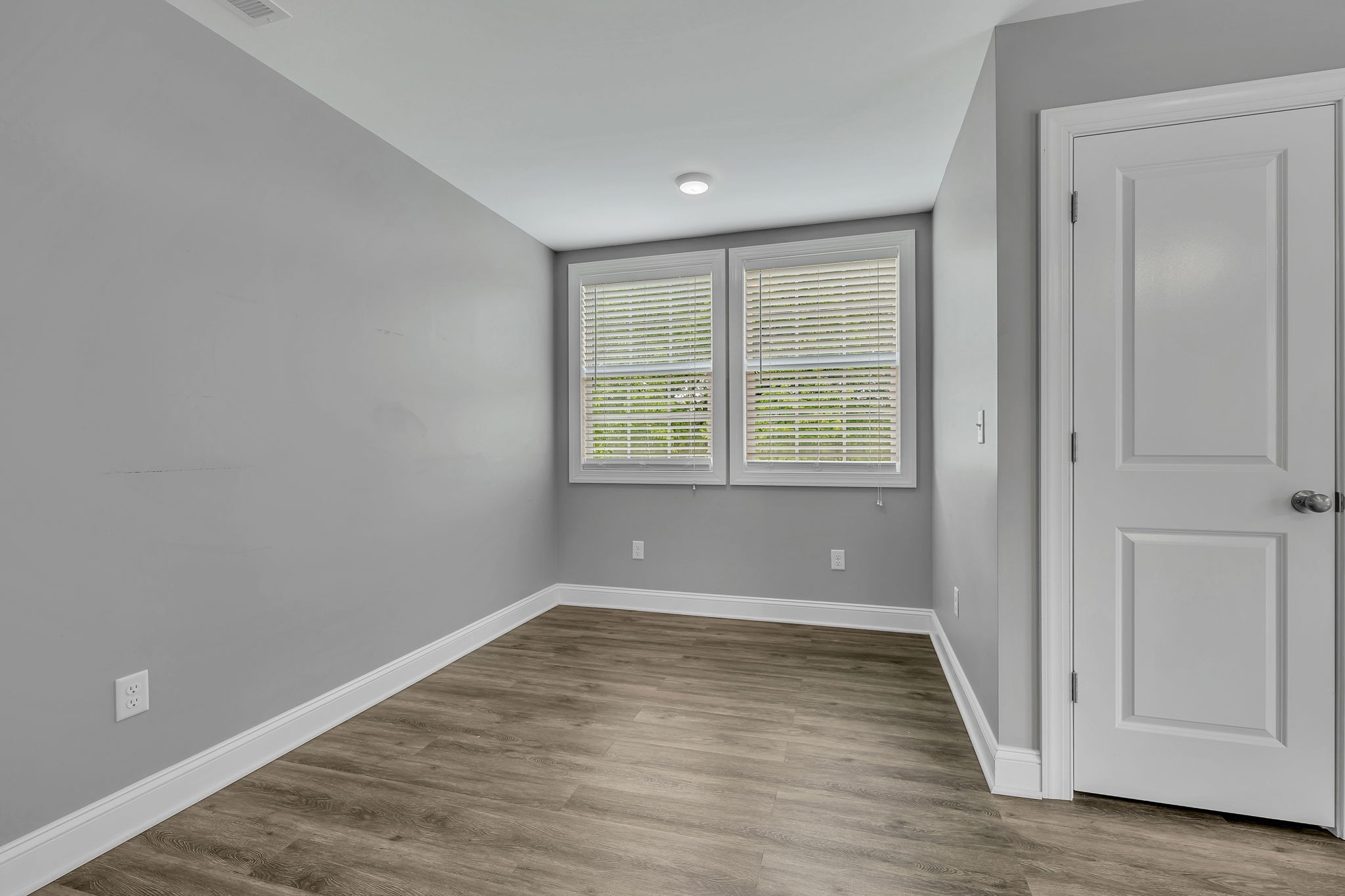 150 Hickman Highway Hickman, TN 38567 - Photo 26 of 42 a view of an empty room with wooden floor and a window