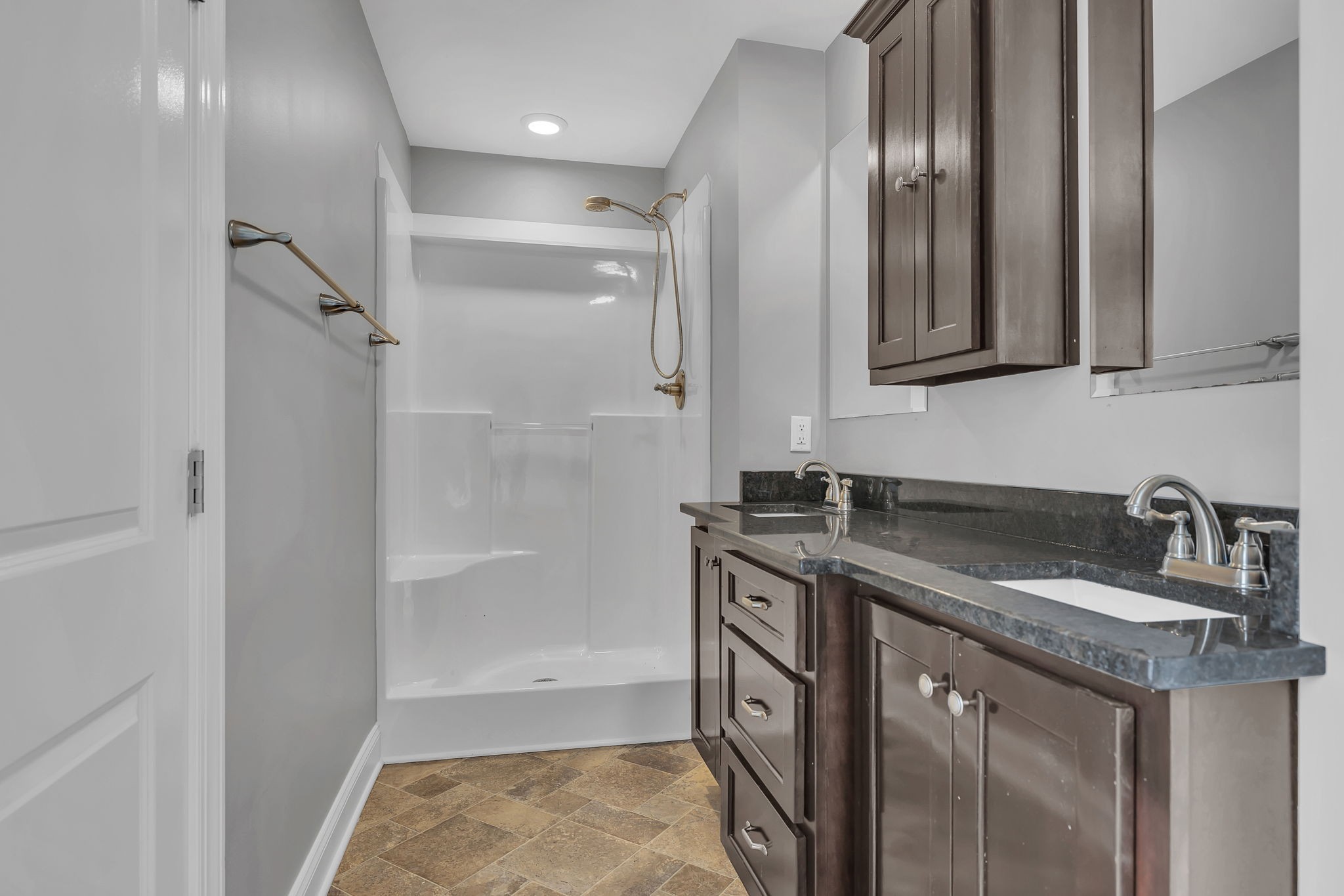 150 Hickman Highway Hickman, TN 38567 - Photo 33 of 42 a bathroom with a granite countertop sink a mirror and shower