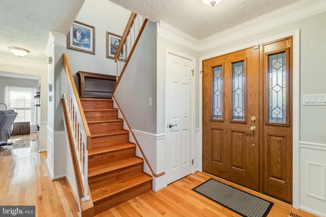 a view of an entryway with staircase