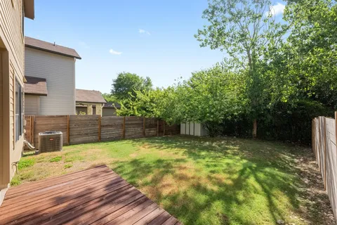 a swimming pool with wooden fence