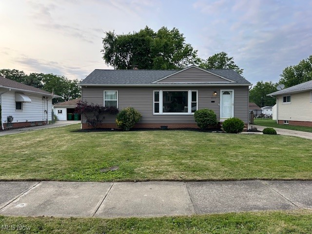 30101 Oakdale Road Willowick, OH 44095 - Photo 12 of 17 View of front of property featuring a front yard and roof with shingles