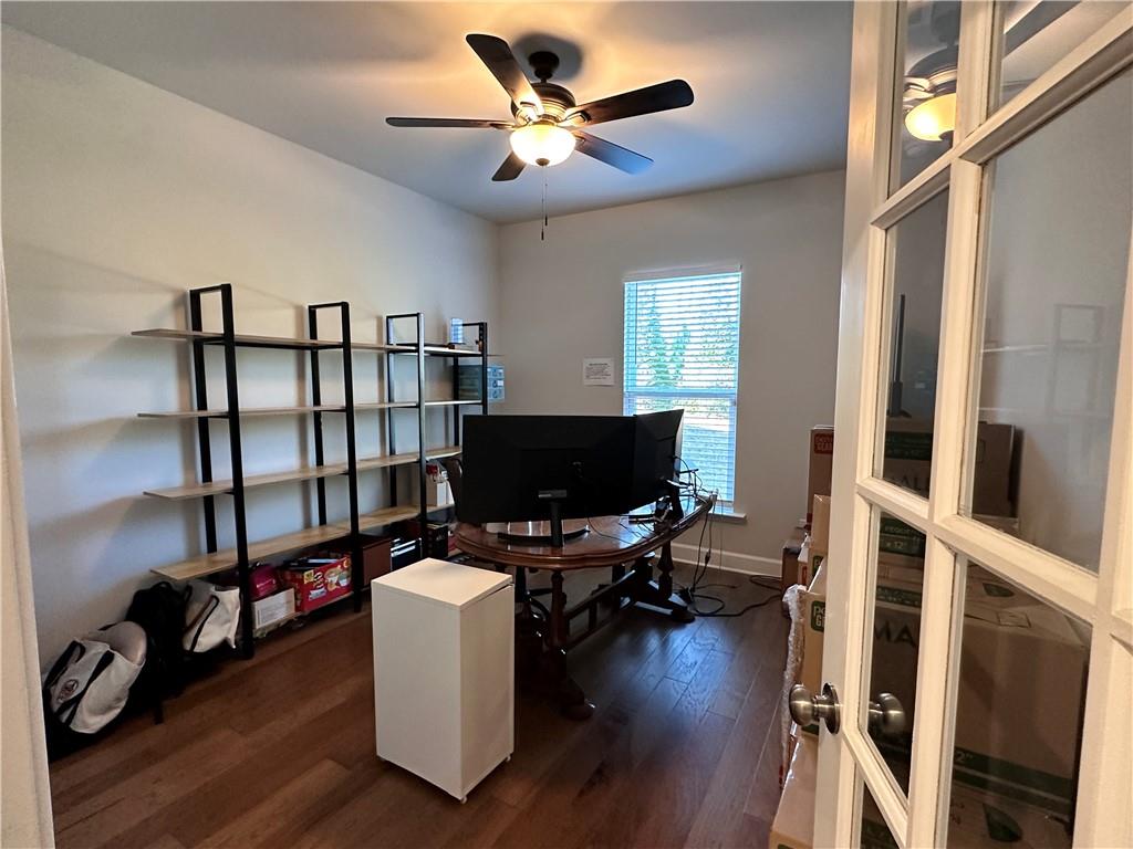 5430 Wheeler Ridge Road Auburn, GA 30011 - Photo 14 of 32 a view of a workspace with furniture and a window