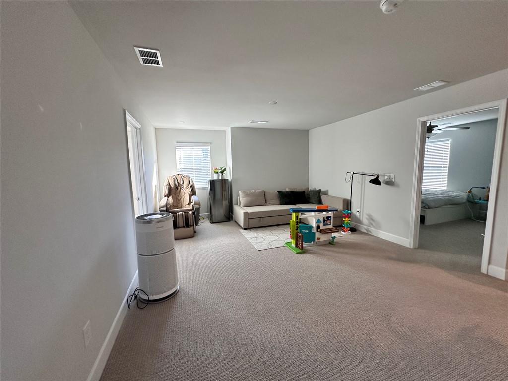 5430 Wheeler Ridge Road Auburn, GA 30011 - Photo 21 of 32 a view of a livingroom with furniture and a livingroom