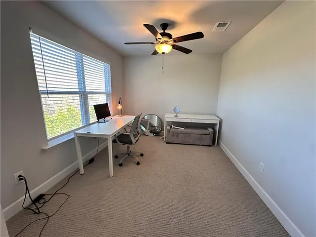 a view of a workspace with a window