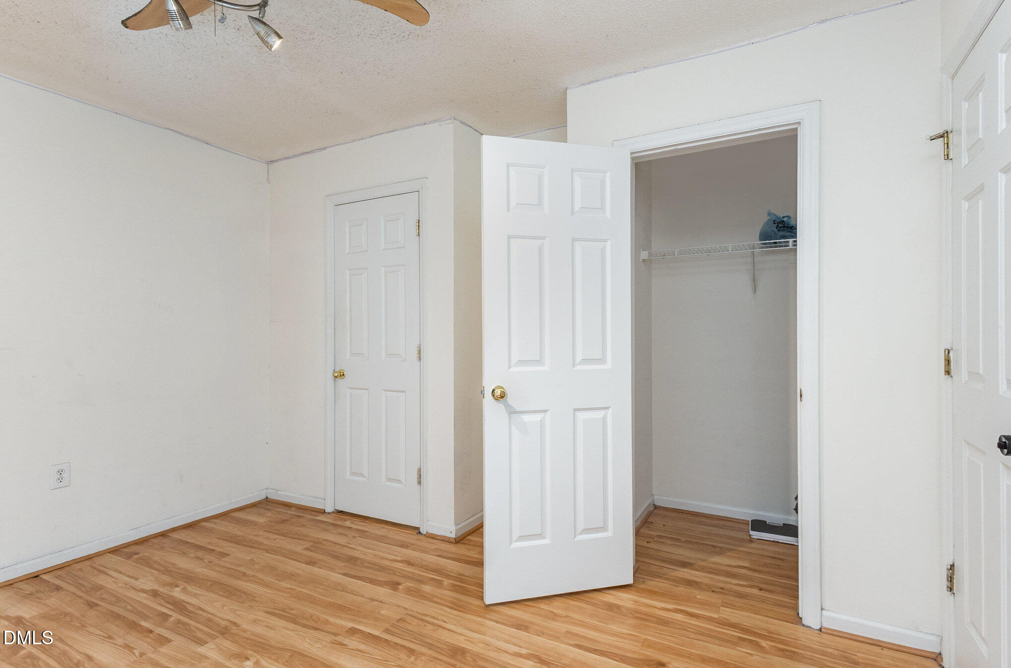 2011 Wolfmill Drive, Unit 301 Raleigh, NC 27603 - Photo 9 of 12 a view of hallway with wooden floor