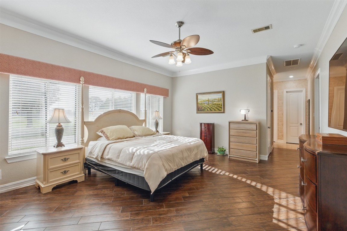 90 Greenview Street Montgomery, TX 77356 - Photo 14 of 34 a bedroom with a bed and a large window