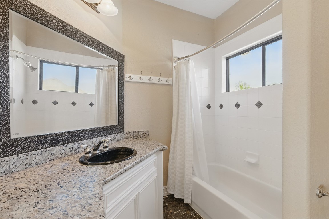 90 Greenview Street Montgomery, TX 77356 - Photo 22 of 34 a bathroom with a sink toilet and shower