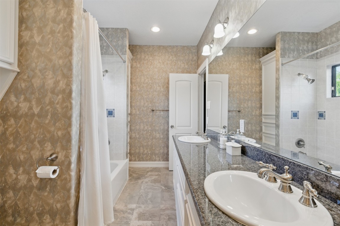 90 Greenview Street Montgomery, TX 77356 - Photo 25 of 34 a bathroom with a sink a toilet and shower