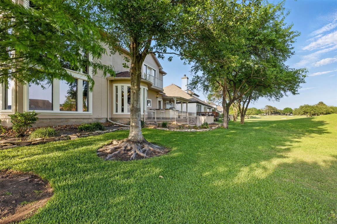 90 Greenview Street Montgomery, TX 77356 - Photo 30 of 34 a front view of a house with garden