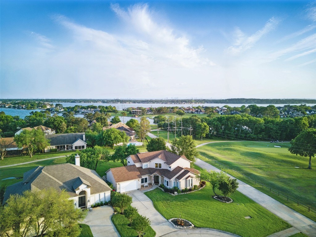 90 Greenview Street Montgomery, TX 77356 - Photo 32 of 34 an aerial view of a houses with outdoor space and street view