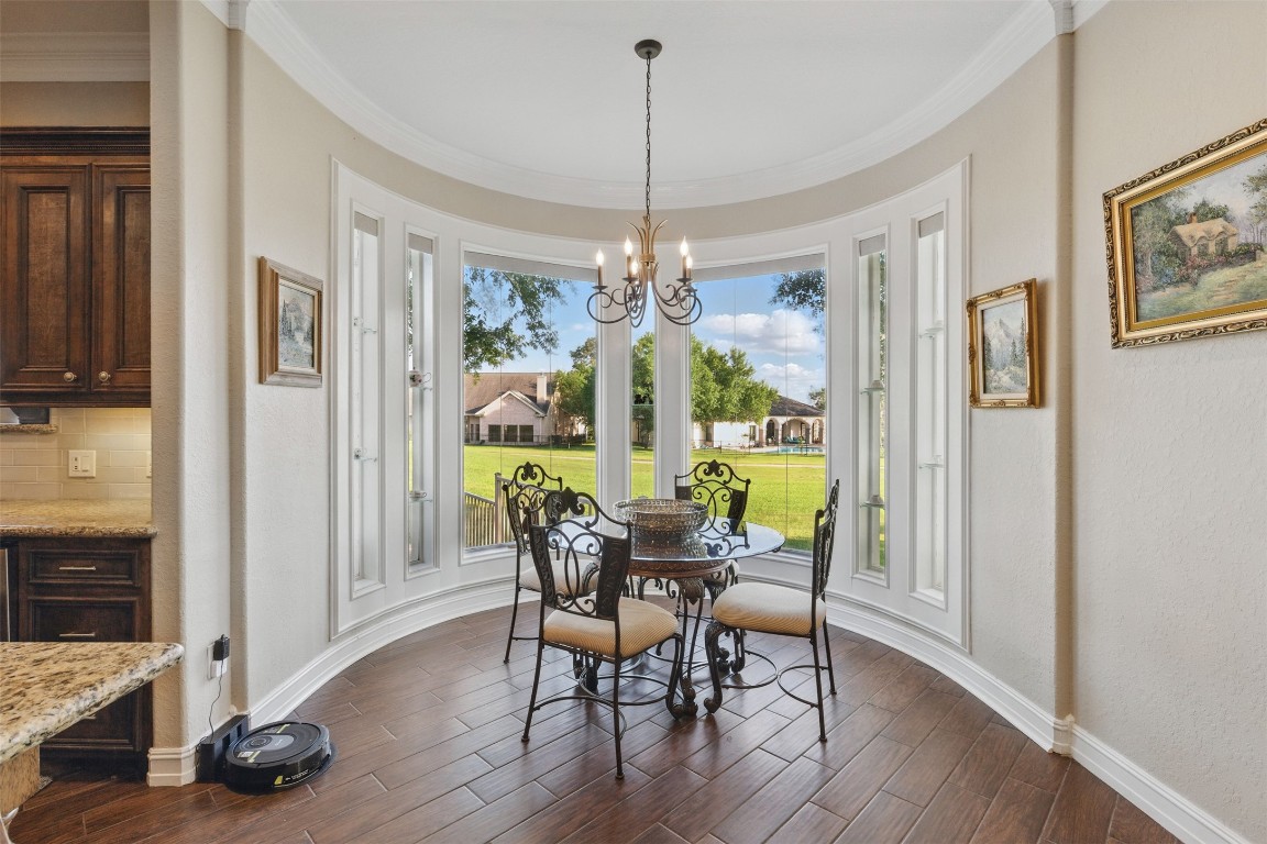 90 Greenview Street Montgomery, TX 77356 - Photo 6 of 34 a view of a dining room with furniture window and wooden floor
