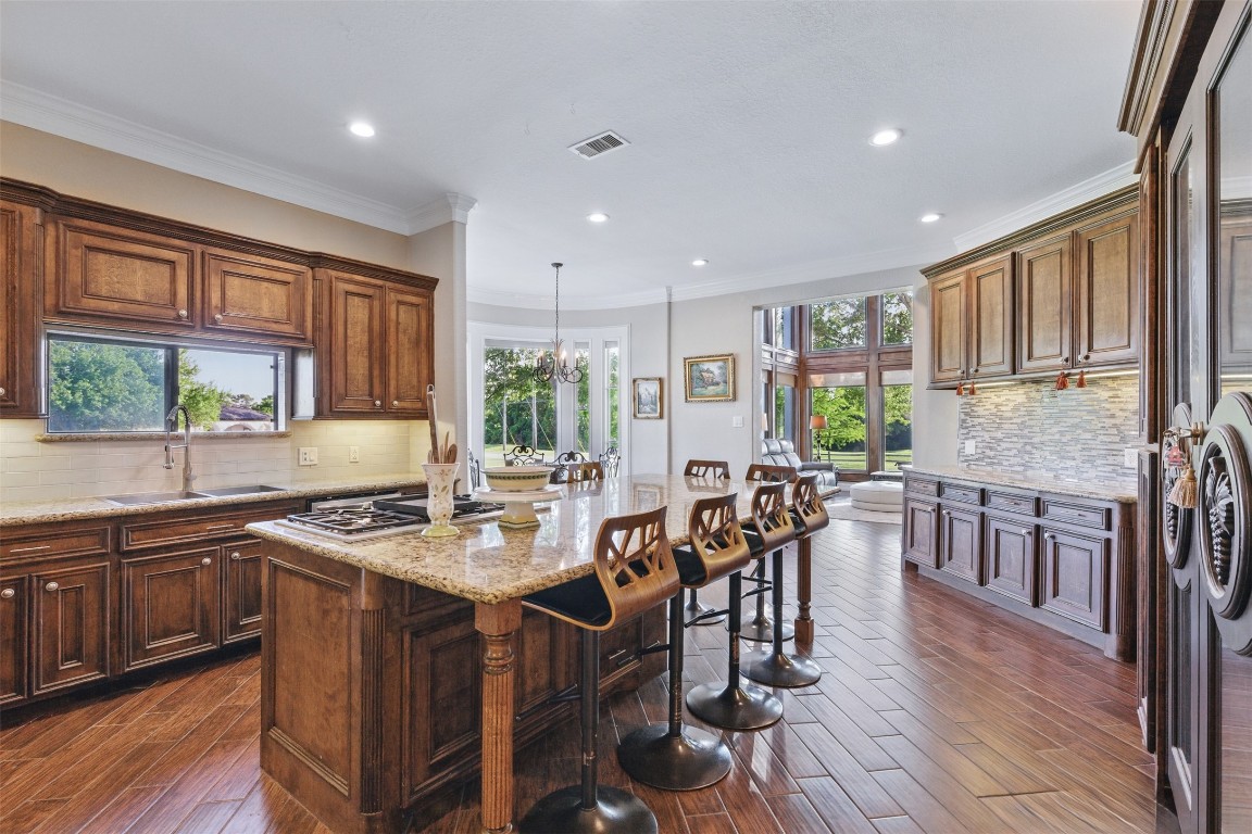 90 Greenview Street Montgomery, TX 77356 - Photo 9 of 34 a kitchen with lots of counter top space and dining table