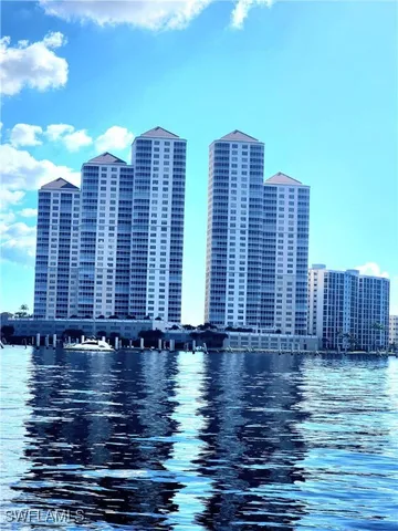 a view of balcony with brick wall