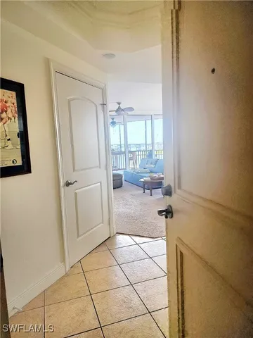 a bathroom with a granite countertop sink a mirror and a shower