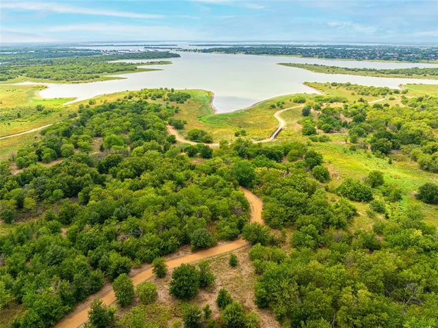 a view of an ocean and a mountain